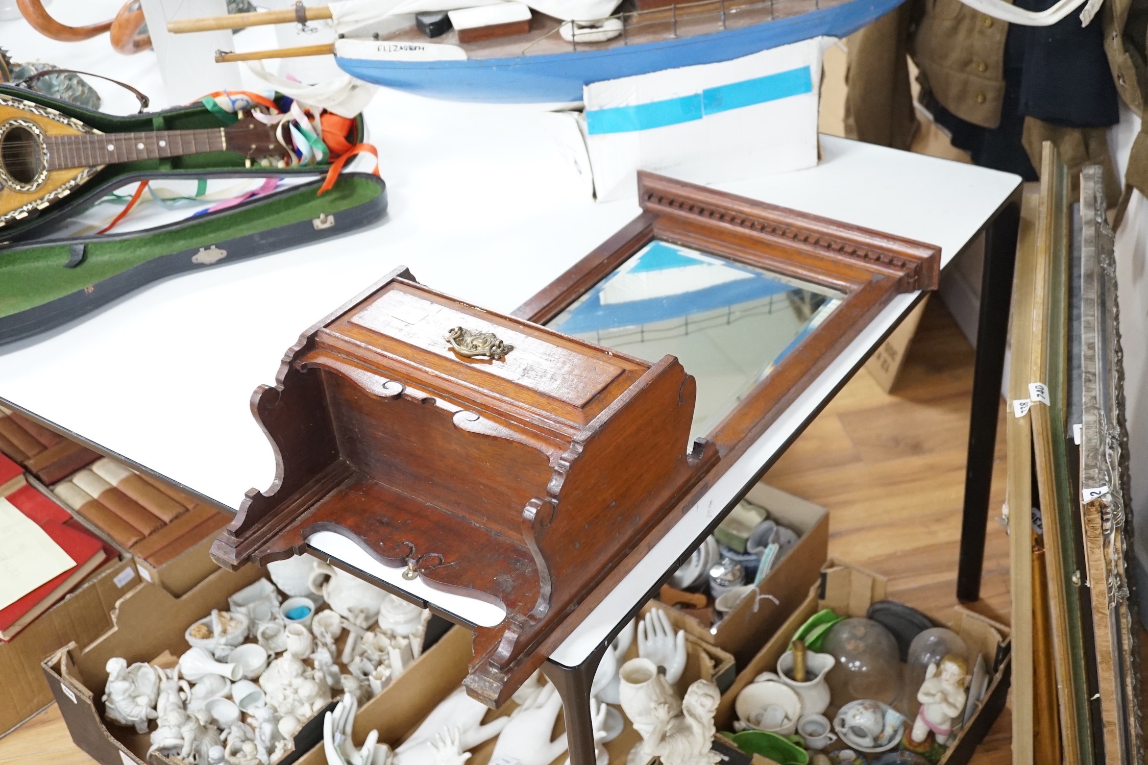 A Victorian walnut single drawer hanging mirror, 77cms high